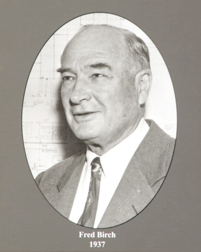 Oval black-and-white portrait of a smiling man in a suit, with a caption showing the name'Fred Birch' and the year '1937' beneath.