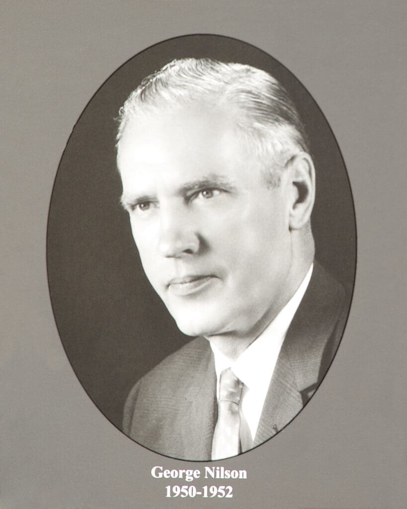 Oval-framed black-and-white portrait of George Nilson, 1950–1952 (caption visible).