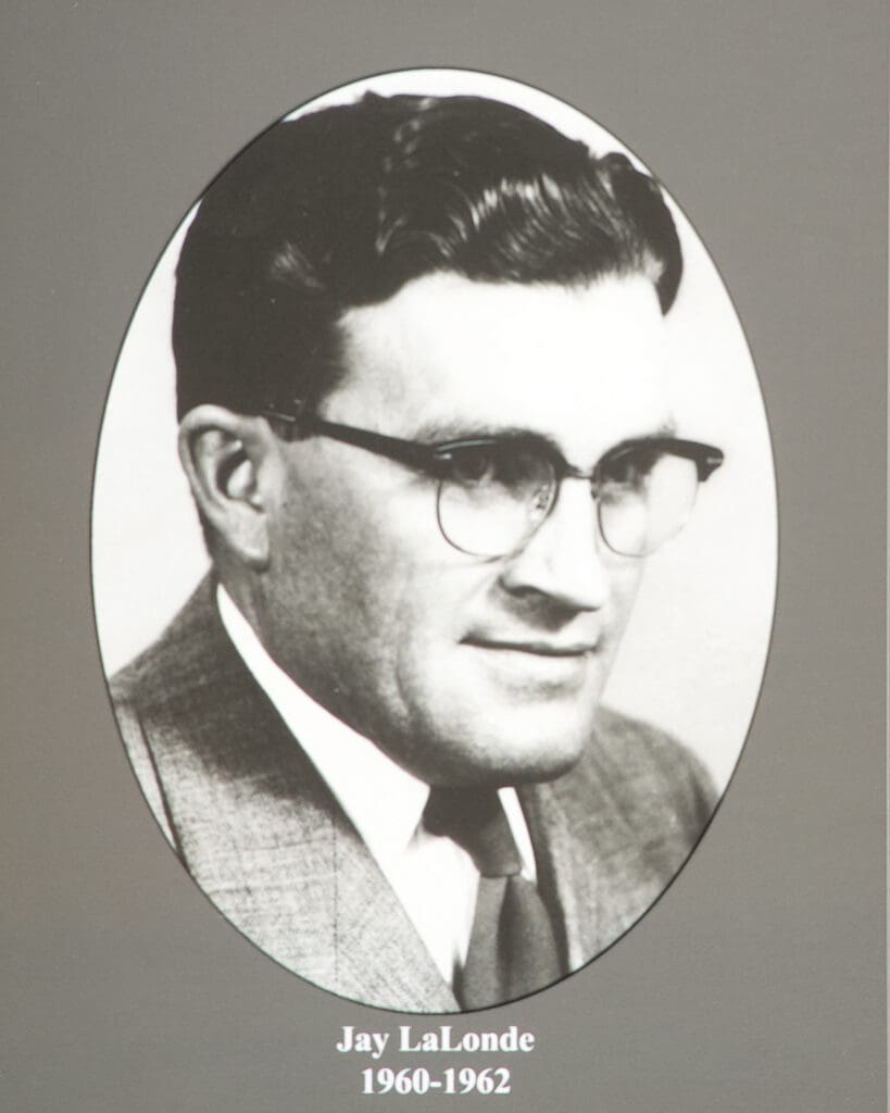 Oval black-and-white portrait of a man in glasses and a suit, labeled Jay LaLonde, 1960–1962.